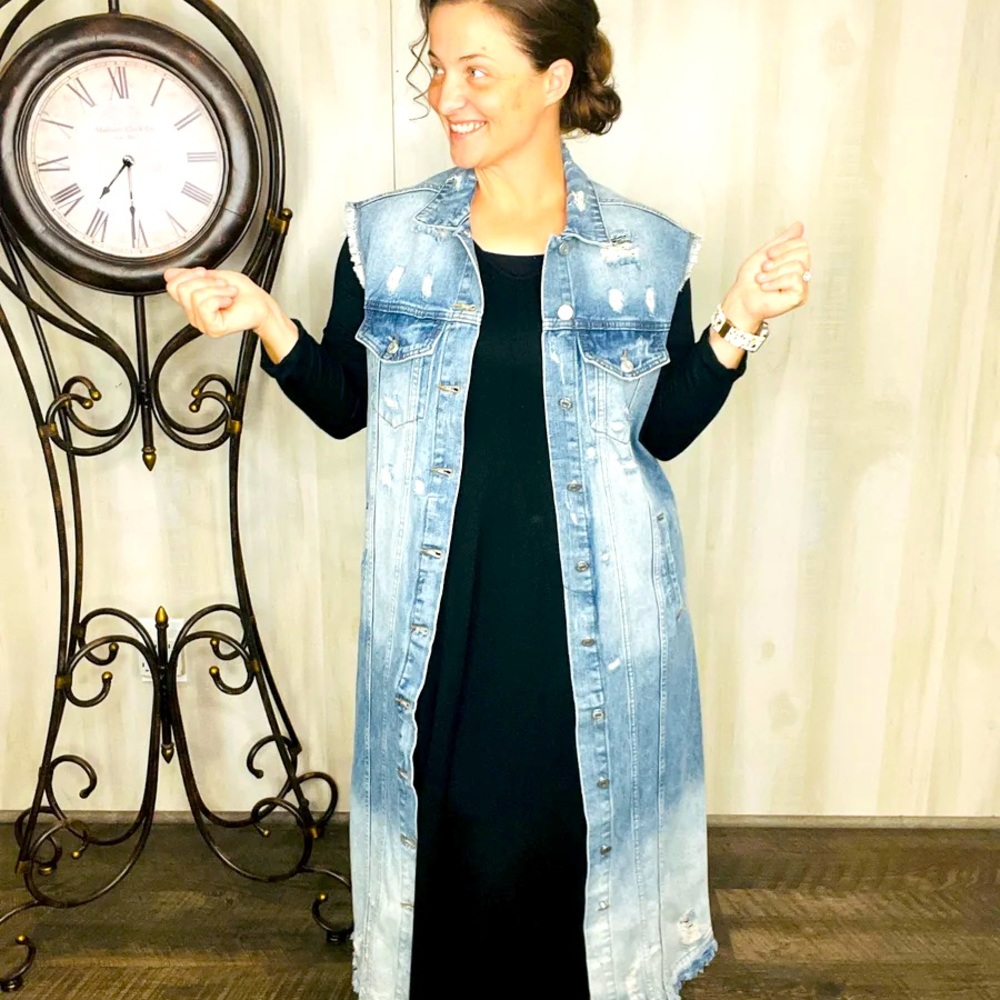 Distressed 
Vest Measures:46” long
Medium: 42"